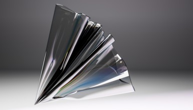 A captivating abstract sculpture crafted from glass, showcasing intricate folds and dynamic
