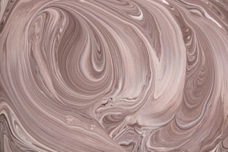 A captivating abstract image of swirling marble, showcasing smooth lines and patterns in warm