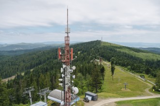 Aerial view showcasing the expansive Bachledka Ski and Sun in Zdiar, Slovakia, featuring lush green