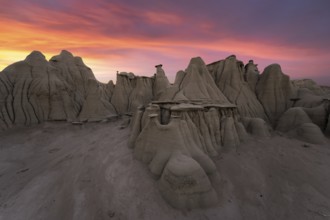 Stunning sunset over the unique rock formations in Bisti/De-Na-Zin Wilderness, New Mexico, USA,