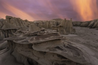 Dramatic sundown illuminates the unique rock formations of Bisti/De-Na-Zin Wilderness in New