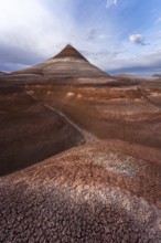 A stunning view of Hanksville Bentonites in Utah showcases layered, multicolored formations under a