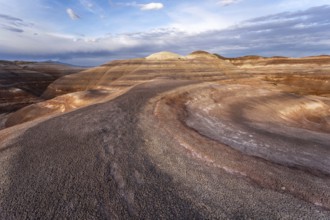 Explore the stunning bentonite hills in Hanksville, Utah. These unique formations showcase layered