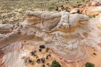 Aerial view of a sandstone rock formation displaying intricate patterns and textures in an