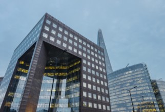 A striking view of London's modern architecture at dusk, featuring towering skyscrapers with