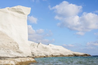 Breathtaking view of unique white rock formations against a clear blue sky at Sarakiniko on the
