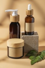 A sleek arrangement of cosmetic bottles on a beige background, featuring elegant packaging with