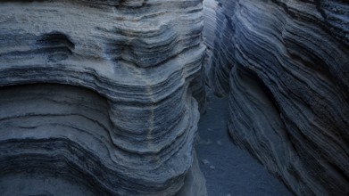 Image showcases the intricate layers and textures of volcanic rocks within Lanzarote Island,