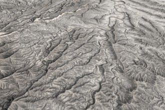 Aerial photograph capturing the intricate, textured ridges of Caineville Mesa near Hanksville,