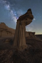 A breathtaking night view of sandstone formations under a starry sky in Goblin Valley State Park,