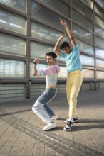 A vibrant gay couple dances joyfully outside, expressing happiness and freedom. Colorful outfits