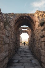 A captivating view through the ancient Roman theatre arches in Merida, Badajoz, Spain. The historic