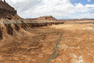 Scenic aerial capture of the unique, eroded rock formations and sprawling terrain at Goblin Valley