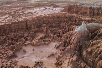 An aerial shot of Goblin Valley State Park in Utah, showcasing the park's unique, eerie geological