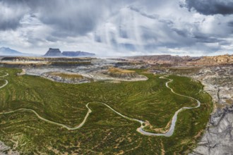 Overhead drone shot capturing the expansive and rugged terrain of Hanksville, Utah, featuring