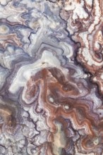 Stunning aerial view of Utah's bentonite sandstone formations. The vibrant layers create a