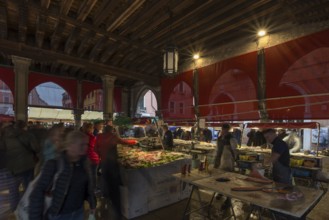 Tourists at the fish market, Rialto market in the San Polo district, Venice, Veneto, Italy