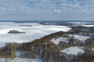 There is snow on the frozen Schaalsee near Zarrentin in the UNESCO Schaalsee Biosphere Reserve.
