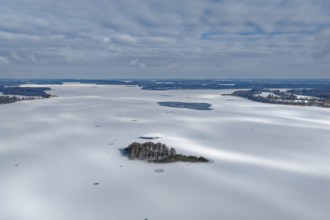There is snow on the frozen Schaalsee near Zarrentin in the UNESCO Schaalsee Biosphere Reserve. In