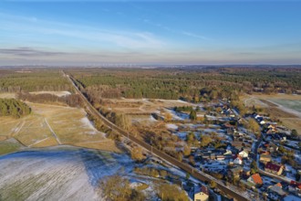 The Angermünde-Eberswallde railway line crosses the winter landscape in the UNESCO biosphere