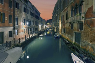 Nighttime atmosphere on the canal in the Dorsoduro district, Venice, Veneto, Italy