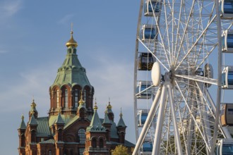 Ferris wheel with Russian Orthodox Uspenski Cathedral, Katajanokka, Helsinki, Finland