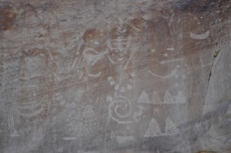 Ancient petroglyphs from the Fremont culture on a rock with mystical signs and symbols, Dinosaur