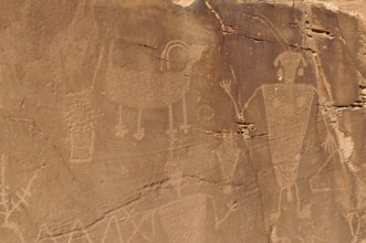 Close-up of petroglyphs from the Fremont culture on sandy rock, Dinosaur National Monument, Utah,