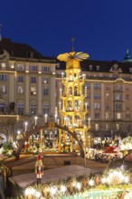 Large pyramid at the Striezelmarkt Christmas market on the Altmarkt in Dresden, Saxony, Germany