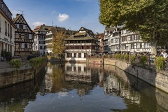 Half-timbered houses and the Maison des Tanneurs on the Ill River in Petite France, Strasbourg,