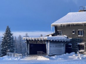 Hotel Pallas with icicles and snow in winter, Pallas-Yllästunturi National Park, Lapland, Finland