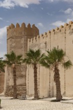 Tower and detail of the ancient city walls of the medieval Medina of Sfax on the Mediterranean