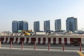 Dubai, United Arab Emirates. June 28th 2019. Highway construction work and modern apartment