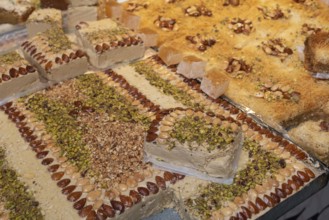 Tasty Tunisian pastries made of pistachio, almond and helva, a popular sweet being sold in the