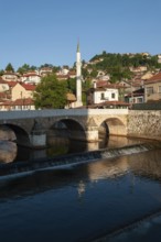 The Šeher-Cehaja Bridge stone bridge crossing the Miljacka River in Sarajevo, Bosnia and