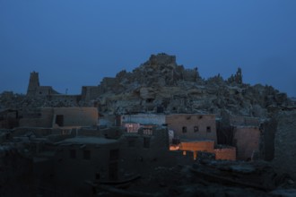 View of the mud brick houses at night inside the ancient fortress of Shali in Siwa Oasis, The Siwa