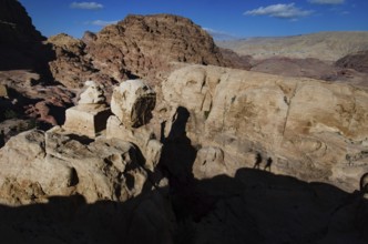 Petra, Jordan. December 11th 2012 Shadows on the Snakes Head Monument, Petra hiking trail, Jordan