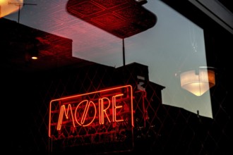 Oxford, England, UK. February 6th, 2020 More, Florescent sign for a local bar or café