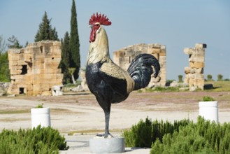 Pamukkale, Turkey, April 25th 2020 Large statue of a rooster cock chicken at the entrance to