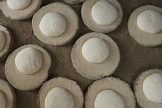 Dough drying to make traditional Baladi flat bread, similar to pitta bread is a staple of Egyptian