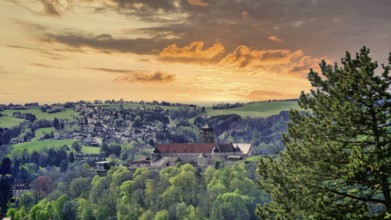 The fortress, Veste Rosenberg in Kronach in the light of a colorful, glowing sunset, Franconian