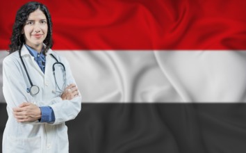 Yemeni medicine and healthcare concept. Doctor close up against Yemen flag background
