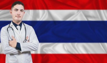 Portrait of medical professional on Thailand flag background. Thai national health system