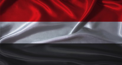 Yemen flag with cloth textured background. National flag of Yemen with realistic texture