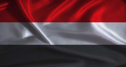 National flag of Yemen with cloth texture. Yemeni flag with realistic texture background
