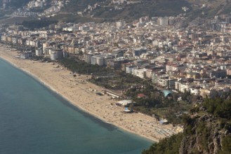 Aerial landscape view of houses and property in Alanya city set on the slopes the Taurus Mountains