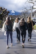 Young woman running, Interlaken, Switzerland