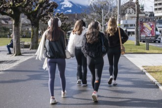 Young woman running, Interlaken, Switzerland