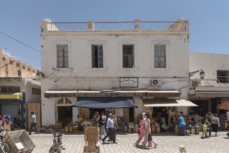 Tunisian shopping in the market of Sfax Medina, Tunisia, North Africa