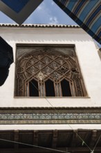 Architectural detailed ornate design of a typical wooden window in the Medina of Tunis, a UNESCO